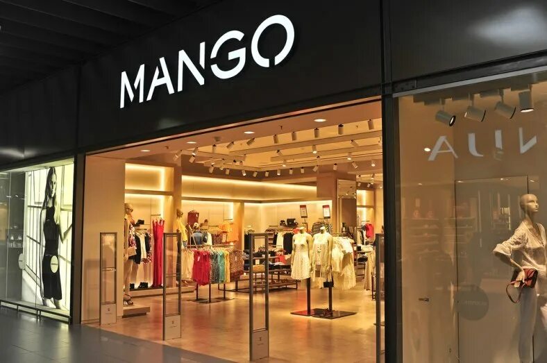 Mango сайт одежда. Mango бренд одежды. манго магазин одежды. mango магазин испания. магазин манго вывеска.