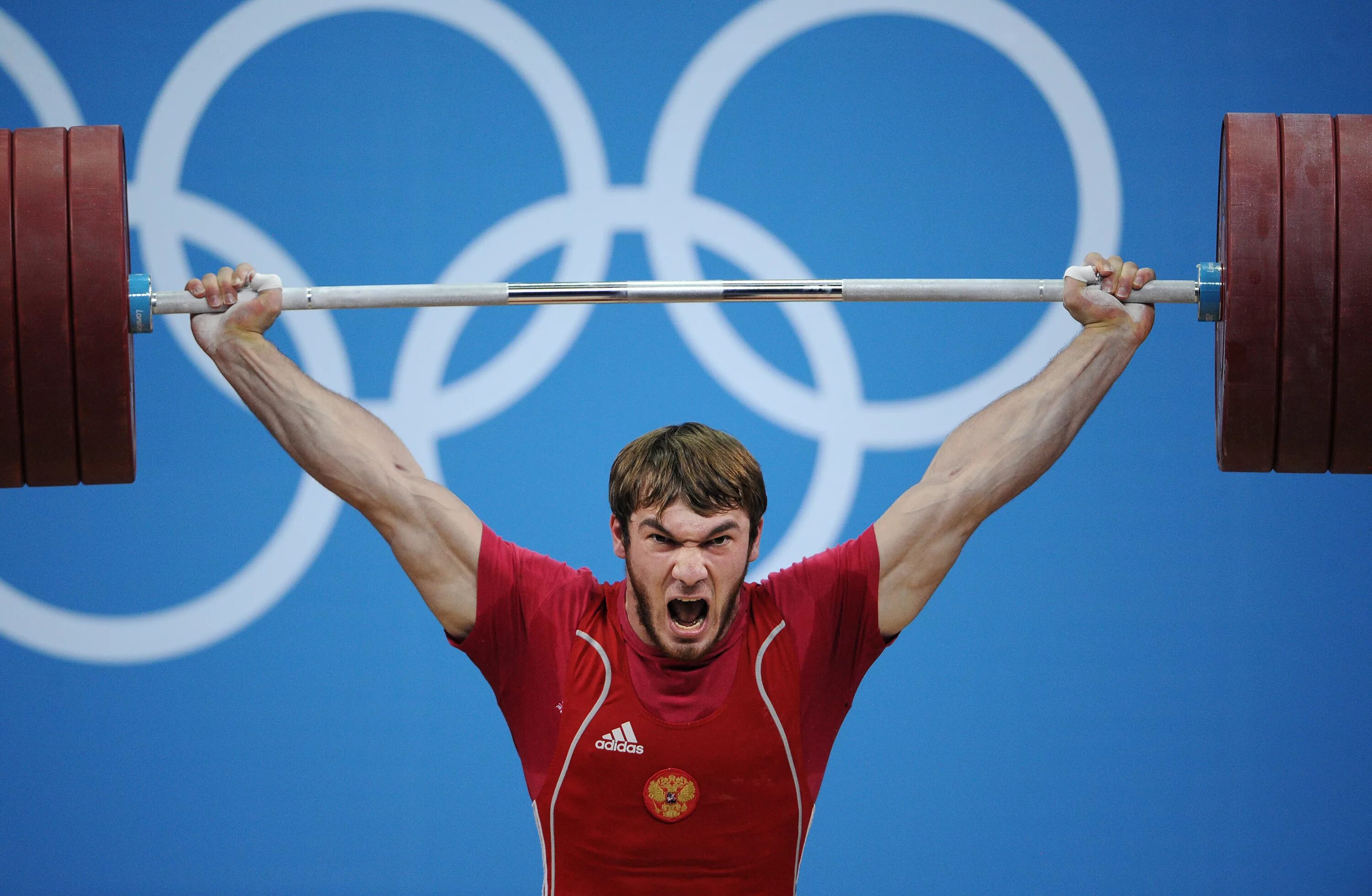 Какой спортсмен входит. Штангист Апти Аухадов. Апти Аухадов тяжелая атлетика. Лапиков штангист.