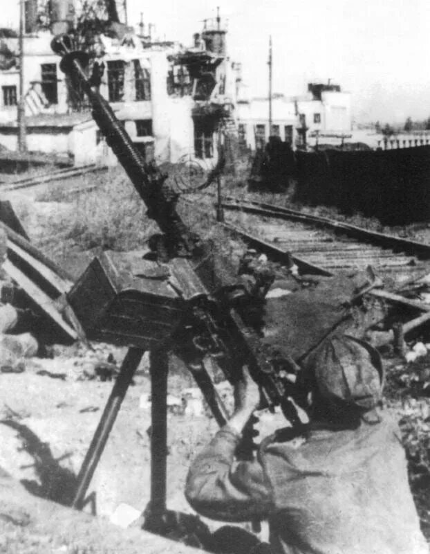 Станковый пулемет дшк. 7. Дшк год. Дшк год. Пулемёт дшк сбоку.