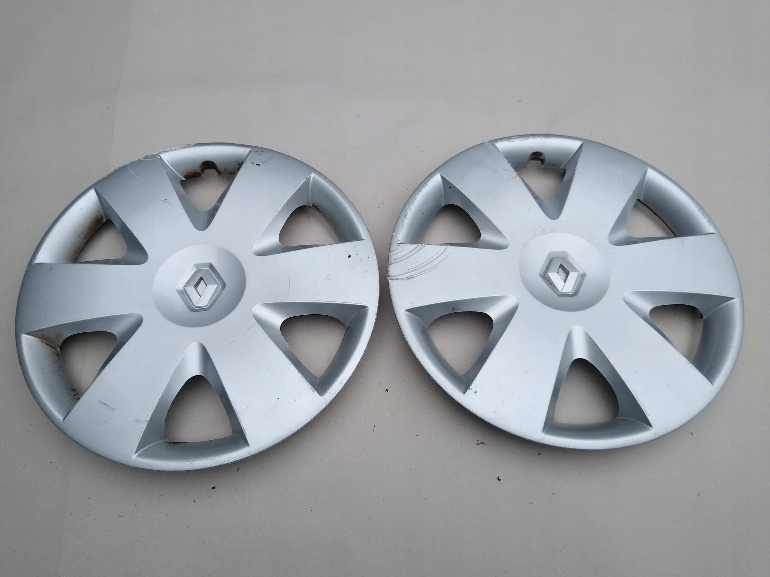 Колпак renault sandero stepway 2. Renault оригинальные колпаки 16. Колпаки renault laguna. Колпаки рено r16. Колпаки на рено логан.