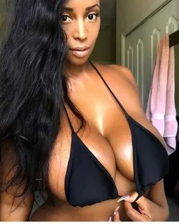 ebony model Shaun Necole in black bikini top.
