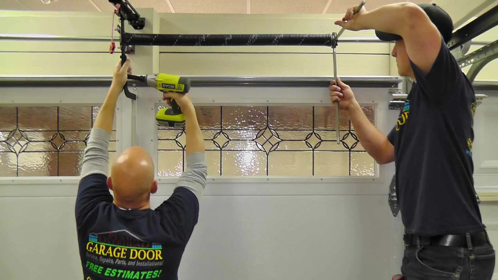 Fix broken install. Garage door spring repair .. garage door installation &amp; repair. arouit garage door. broken garage door spring.
