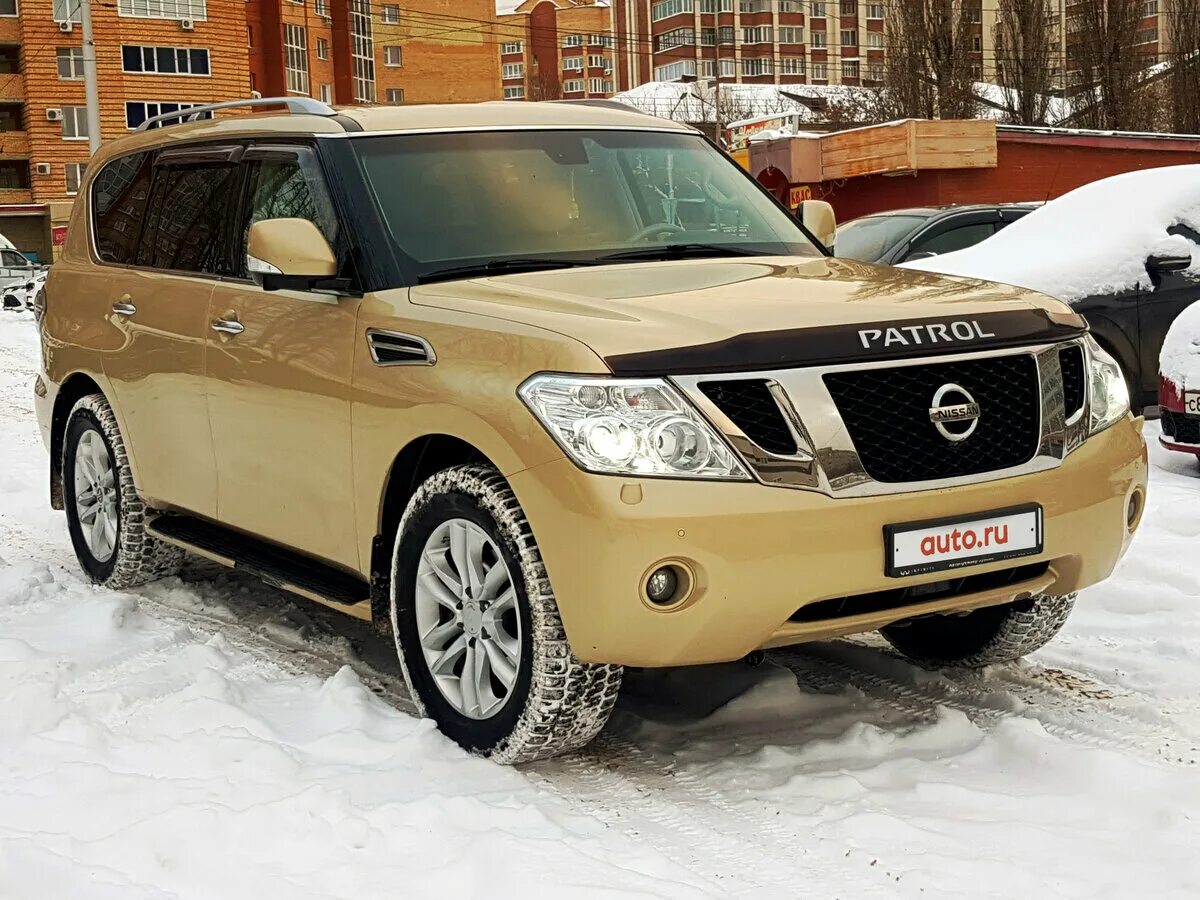 Ниссан патрол y62 купить. Nissan Patrol vi (y62). Nissan Patrol y62 бежевый. Ниссан Патрол у62 золотистый. Nissan Patrol 2012 золотистая.