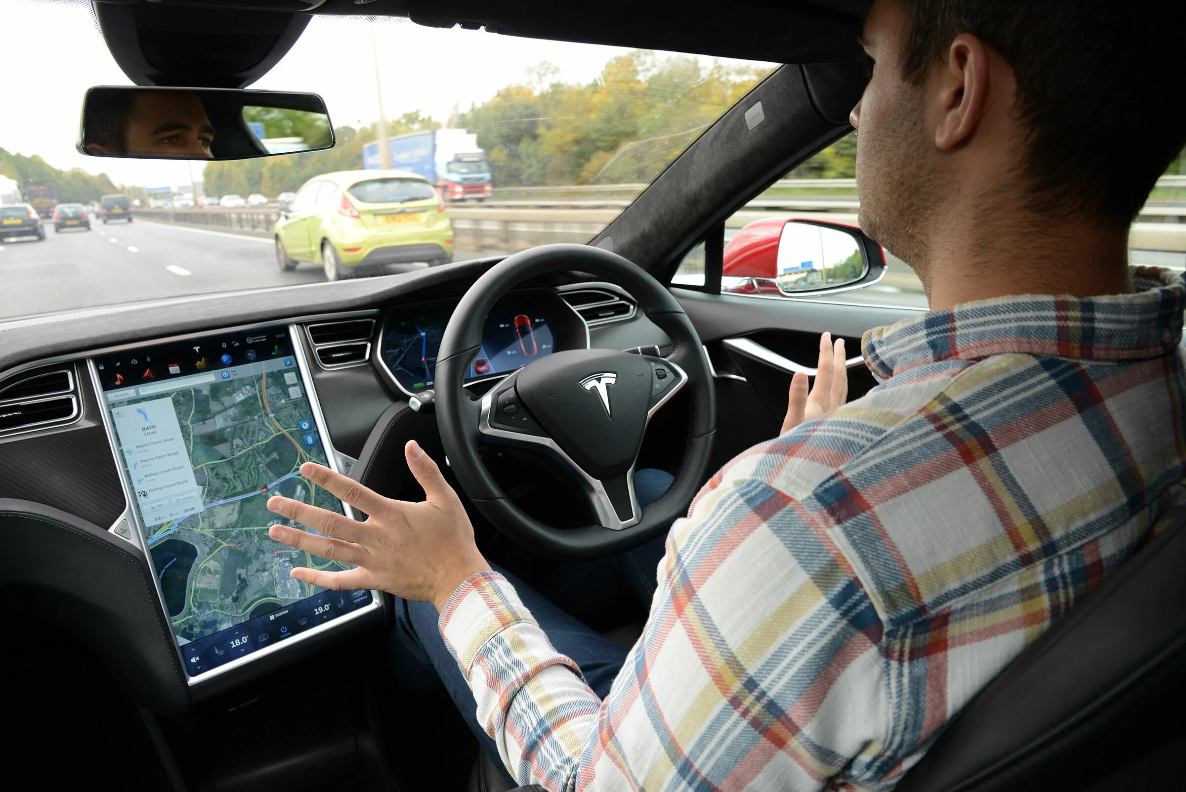 Driverless Tesla cars. Тестирование беспилотных автомобилей. GPS беспилотный автомобиль. Беспилотные автомобили внутри.