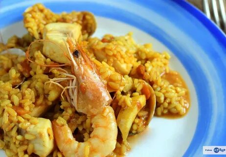 Introduzir imagem paella rapida de mariscos. 