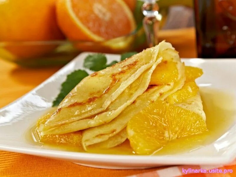Креп сюзетт с апельсиновым соусом рецепт. Креп Сюзетт с апельсиновым соусом. Блинчики Сюзетт с апельсиновым соусом. Блины креп Сюзетт. Блины Сюзетт с апельсинами.