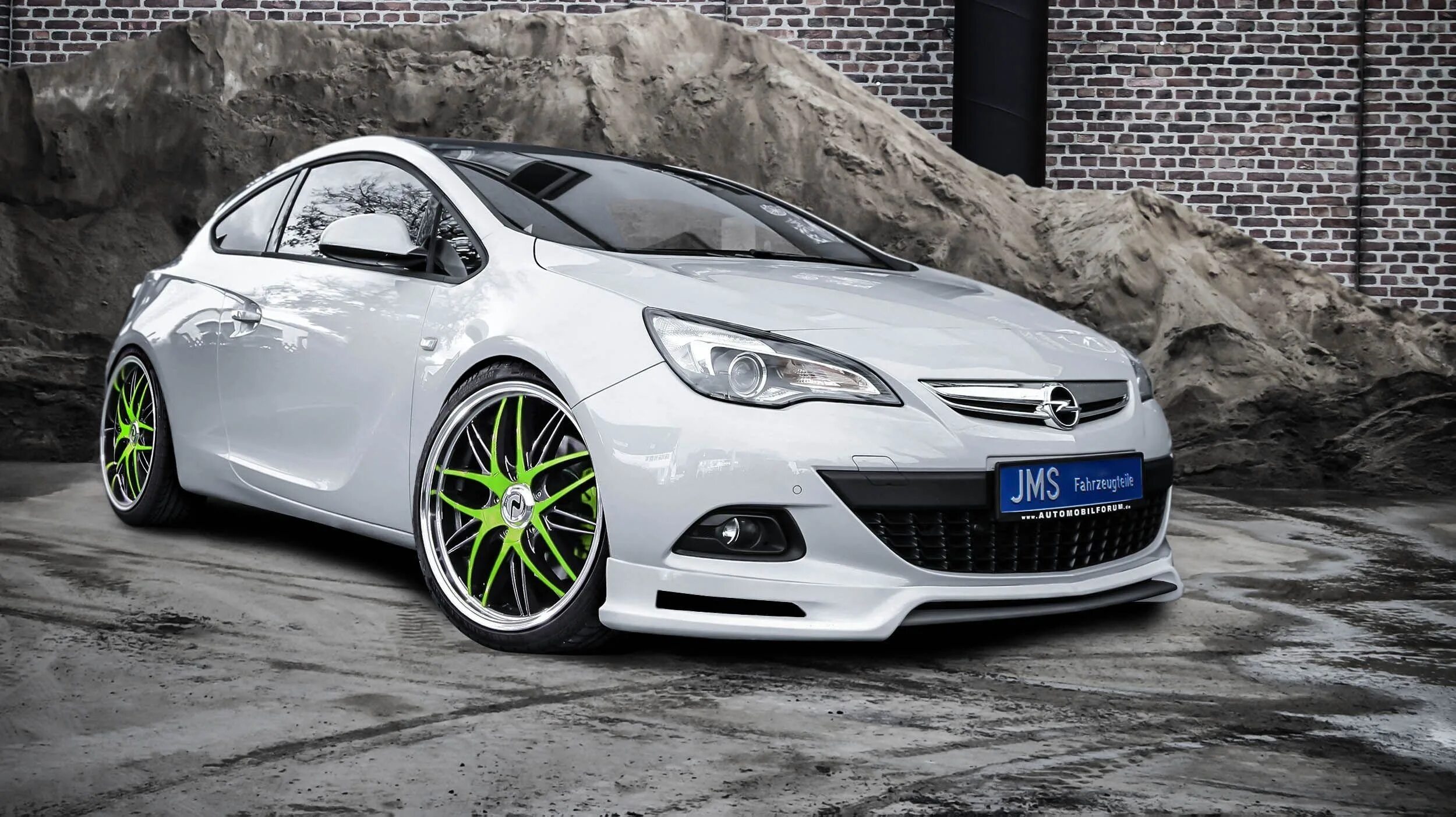 Тюнинг опель j. Opel Astra GTC Tuning. Opel Astra j GTC. Opel Astra 2012 Tuning.