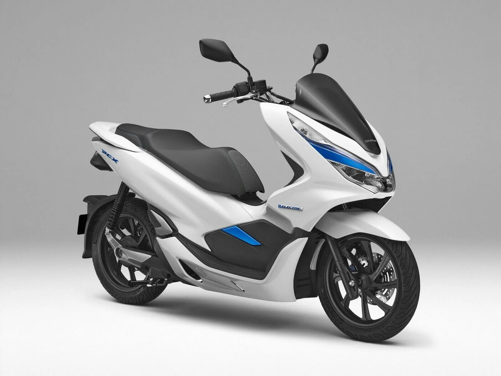 Новый скутер в беларуси. Honda PCX 150. Скутер Хонда 125 PSX. Макси скутер Honda PCX 150. Honda PCX Electric.