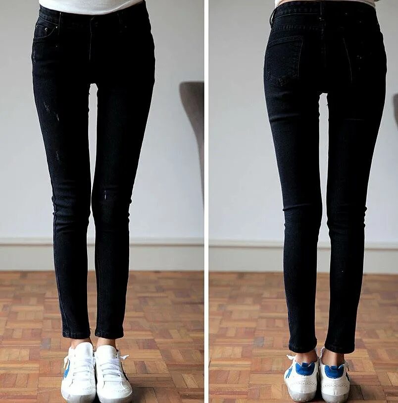 Черные потертые джинсы женские. Черные джинсы теплые. Черные джинсы с потертостями женские. Джинсы женские чёрные удлиненные.