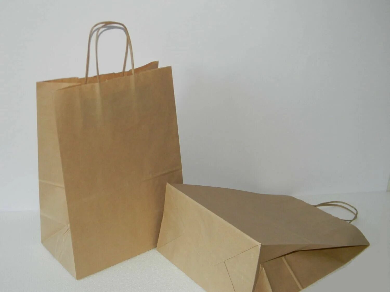 пакет бумажный крафт 240х140х280 мм с кручёными ручками. крафт пакет 32х37. пакет крафт бумажный с кручеными ручками 22x12x25. крафт пакет с кручеными ручками. крафт пакет бумажный кручеными ручками 240*140*280.