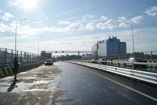 Дирекция транспортного строительства спб. 1 Лахтинский мост. Лахтинский путепровод. Лахтинский разлив пешеходный мост. Виадук СПБ Савушкина.