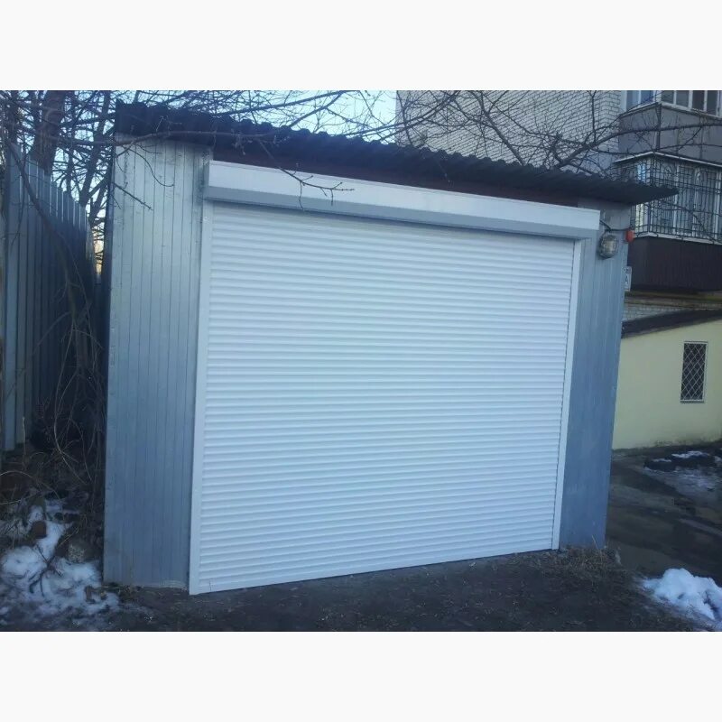 рольворота бу. киоск с рольставнями. рольворота для покрасочной камеры. продажа роллетов  и магазинов на центр рынке в приморско ахтарске. рольворота бу.