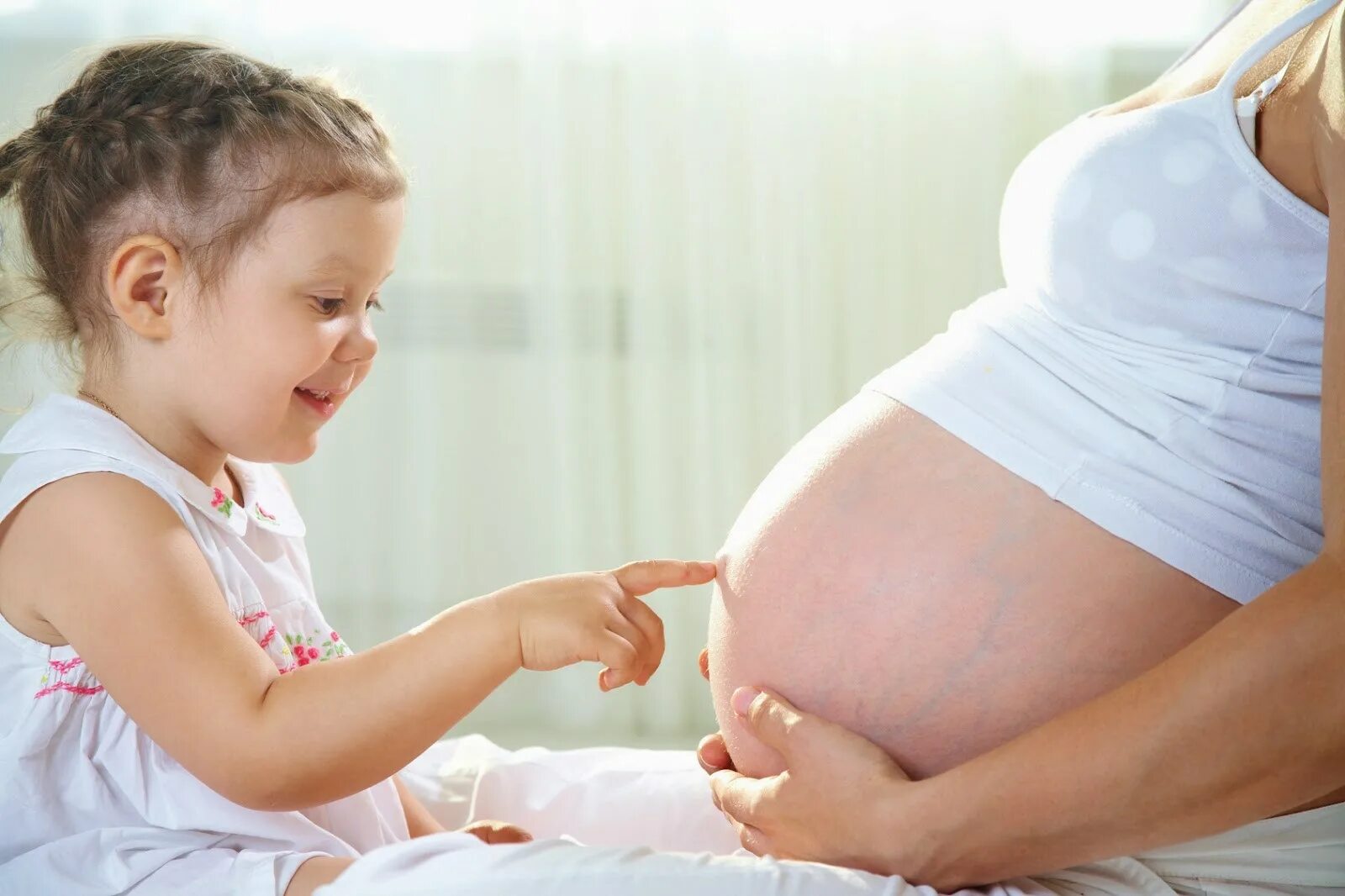 Беременный женщина родился