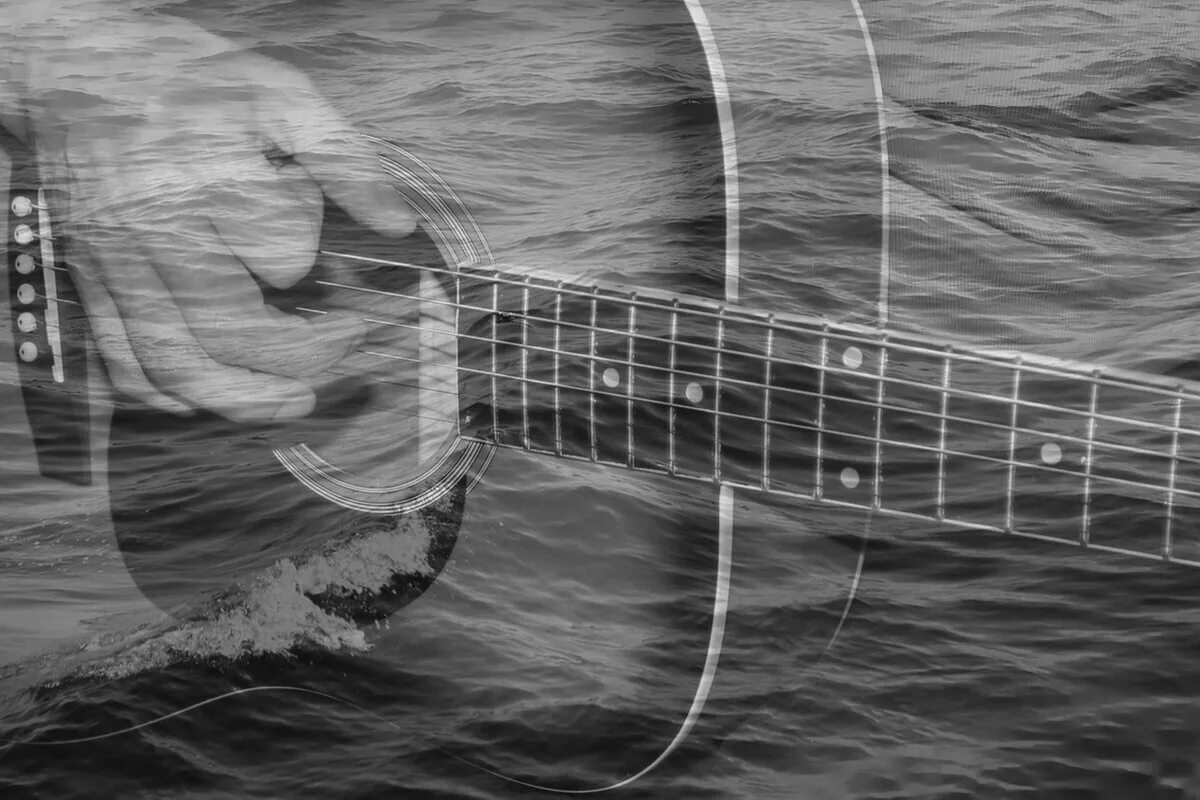 Музыкальная волна. Гитара остров. Фотография на которой волна музыкальная. Мелодия - волна.