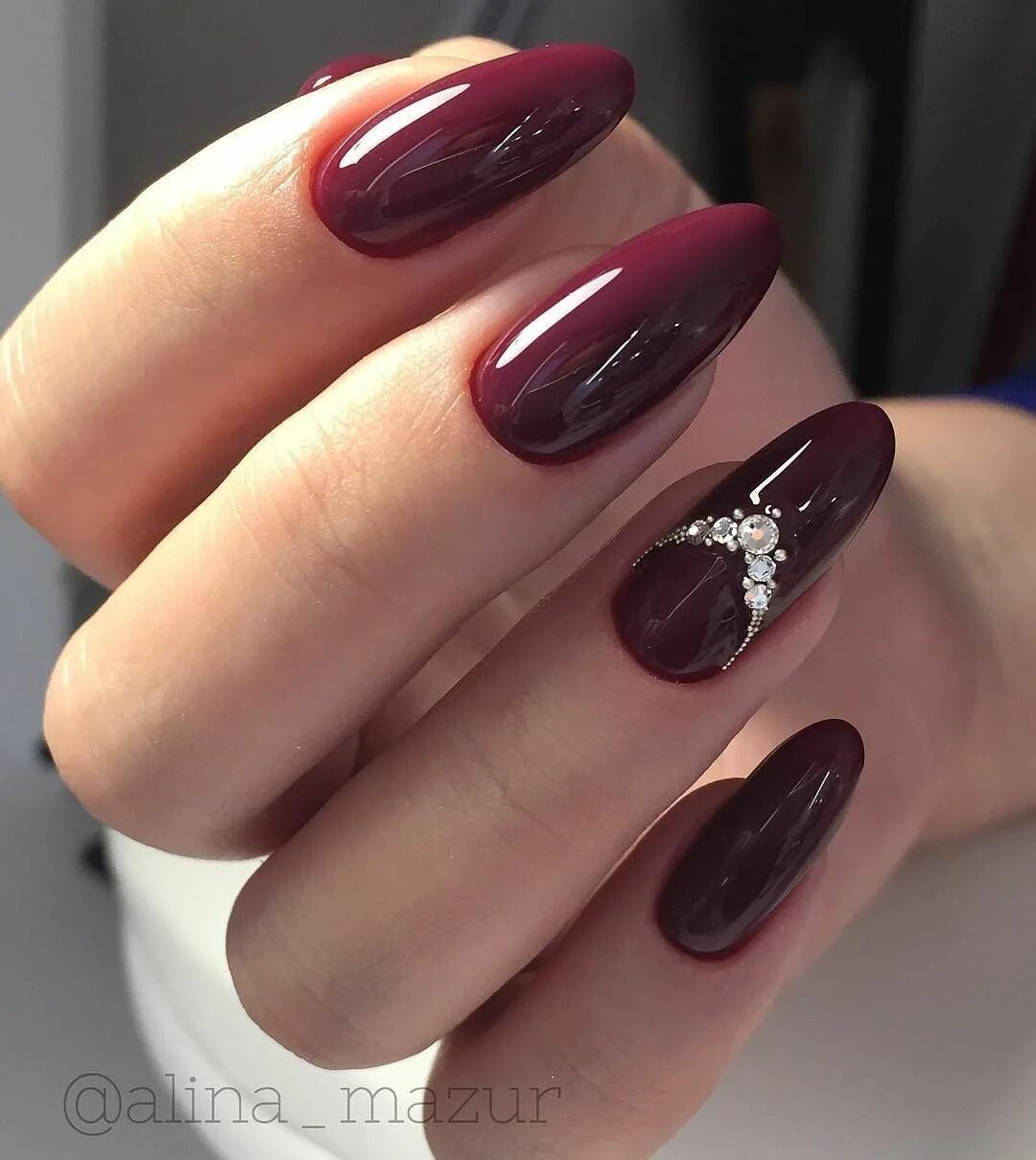 Burgundy almond manicure