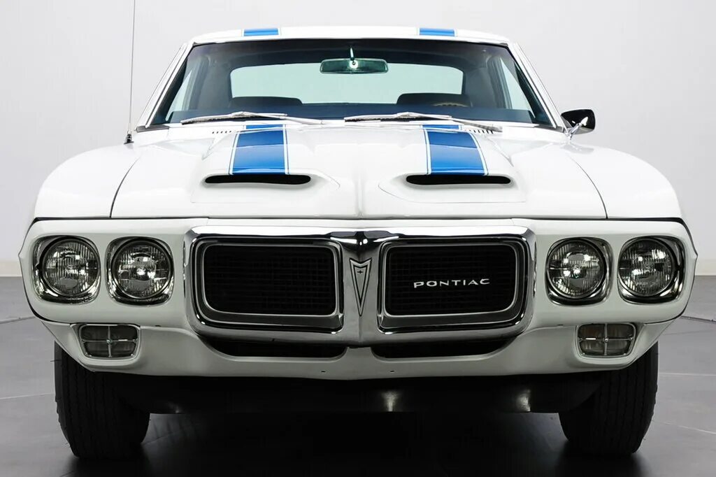 Pontiac firebird 1. Pontiac firebird 1969. понтиак фаерберд 1 поколение.