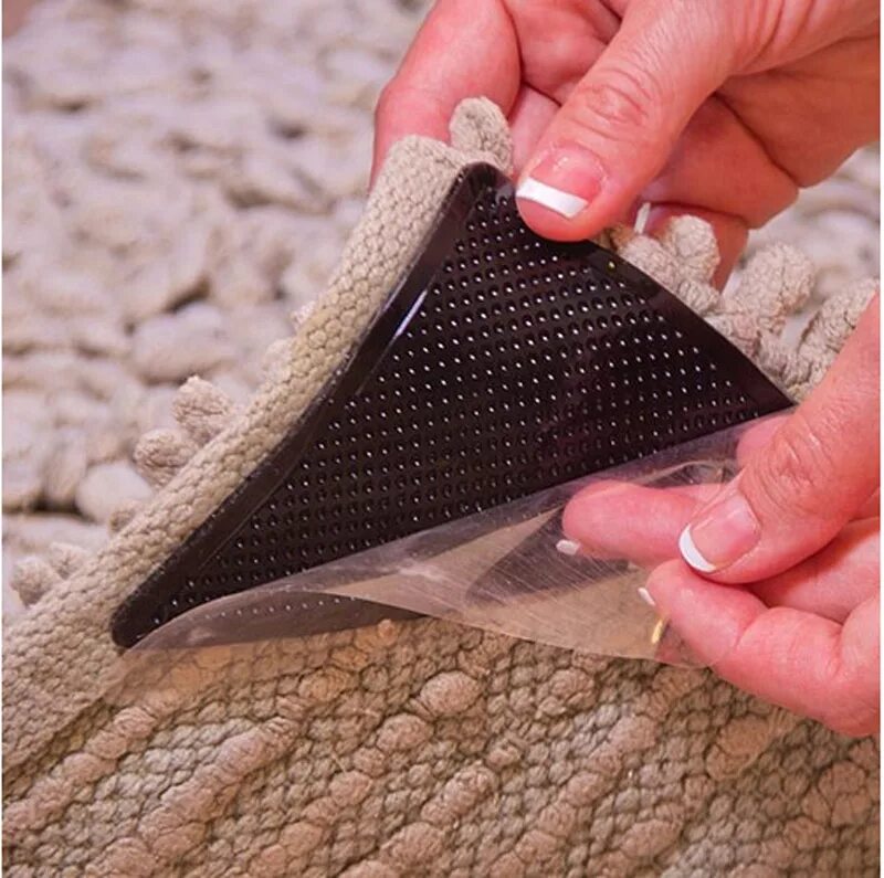 Антискользящие уголки для ковра. Чтобы ковёр не скользил по ламинату. Уголки для ковра противоскользящая. Нескользящий коврик по ламинату. Нескользящие накладки для ковров.