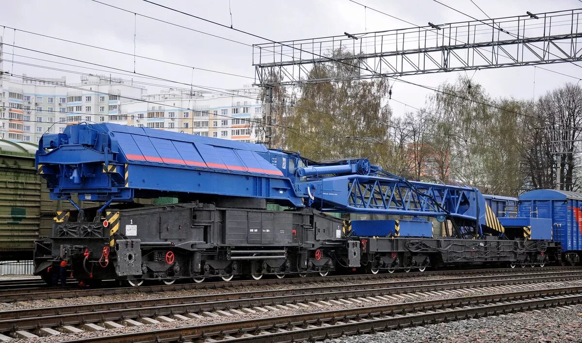 Машинист восстановительного поезда. Железнодорожный кран EDK 2000. ЖД кран ЕДК 2000. Железнодорожный кран КЖ-461. Восстановительный кран ЕДК.