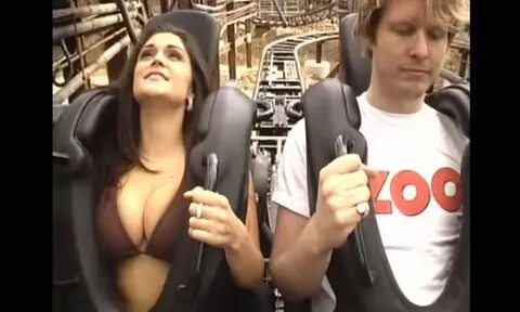 Tits popping out on slingshot ride.