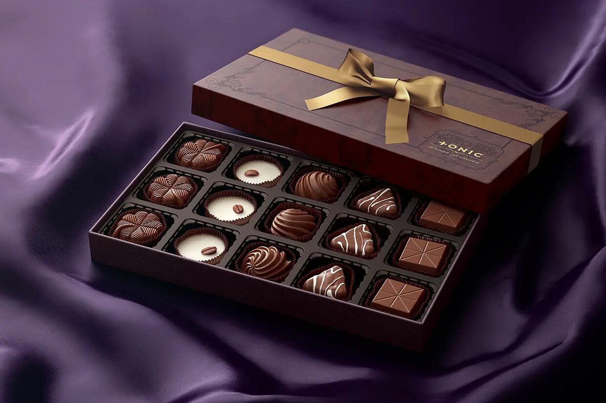 Коробка шоколадных конфет. Шоколадные конфеты в коробках. Подарочная коробка конфет. Красивые конфеты в коробках.