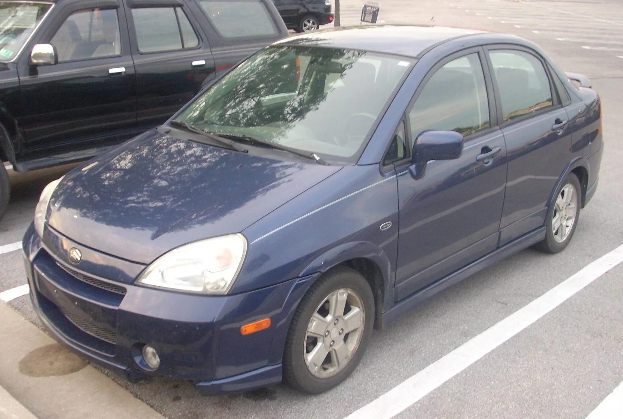 Купить сузуки аерио. Сузуки Аэрио 2002. Suzuki Aerio 2002. Suzuki Aerio sedan. Suzuki Liana 2002 седан.