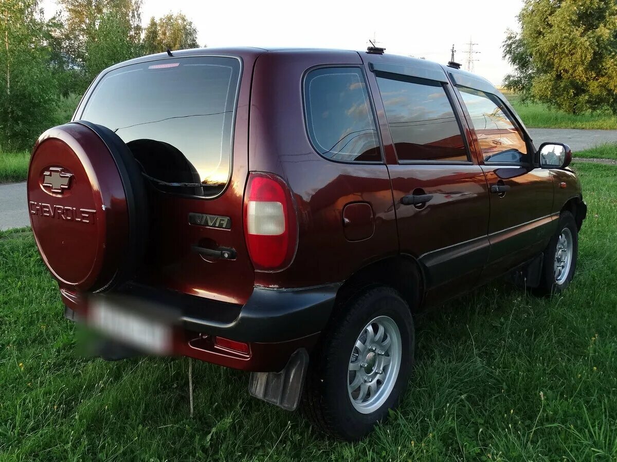 Шеви бу на авито. Chevrolet Niva 2004. Шевроле Нива 2004 вишня. Нива Шевроле 2004 вишнёвая. Нива Шевроле красный цвет 2004 год.