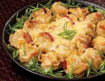 Пельмени с луком и сыром