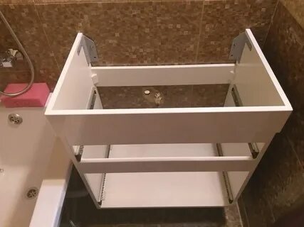 Крепление подвесной тумбы с раковиной