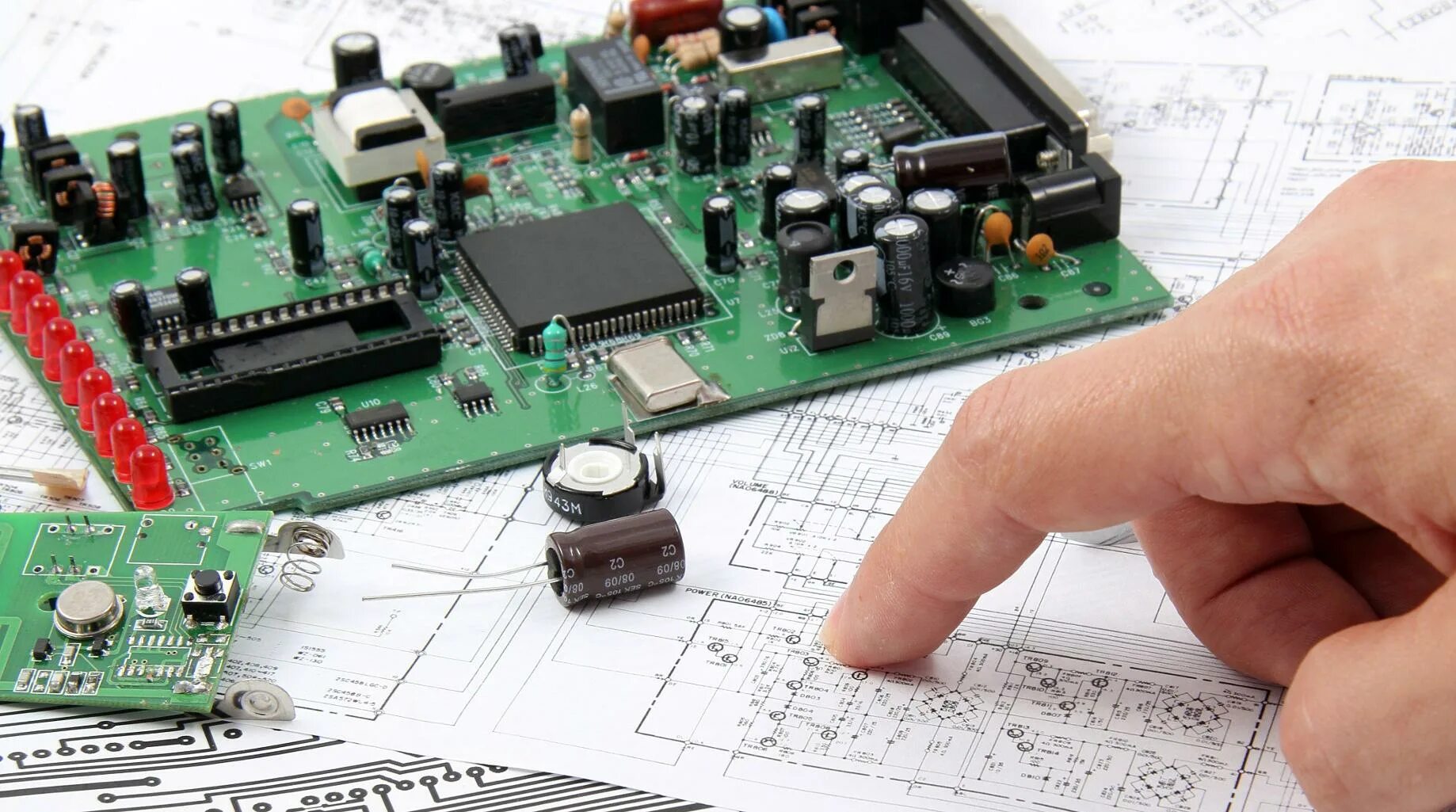 Контрактная разработка электроники. Проектирование печатной платы. Электронная плата. Электронные детали платы. Автоматизированные системы проектирования печатных плат.