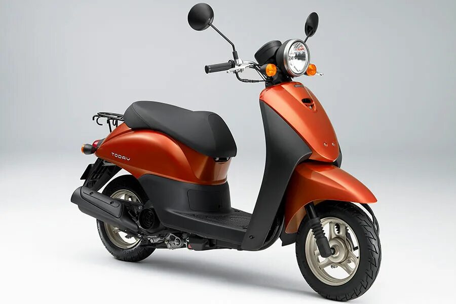 Скутер хонда длинный. Honda dio 50 кубов. Honda dio 4-х тактный. Honda lead 50 af48. 4х тактные скутера хонда.