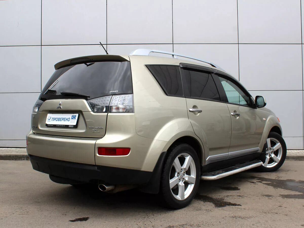 Mitsubishi outlander 2007 года. Митсубиси Аутлендер 2007. Митсубиси Аутлендер XL 2007. Митсубиси Аутлендер 2007 2.4.