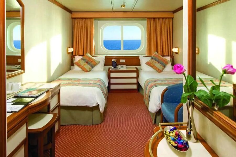 Каюта сколько мест. Costa favolosa каюты. costa toscana каюты. costa cruises каюта.