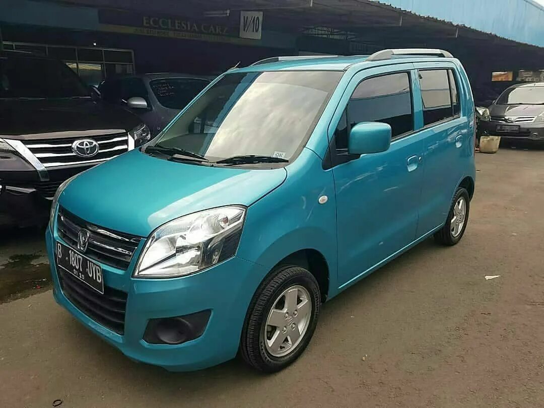 Вагон р привода. Suzuki Wagon r 2015. Сузуки вагон р 2015 год. Suzuki Wagon r 2005. Suzuki Wagon r 2009.