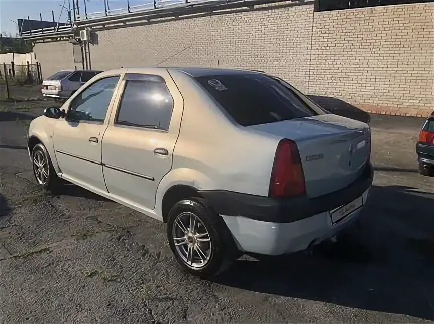 Рено логан с пробегом в тюмени. Renault logan 2005. рено логан 2005 года. renault logan 2005 синий. болячки рено логан 2005 года.