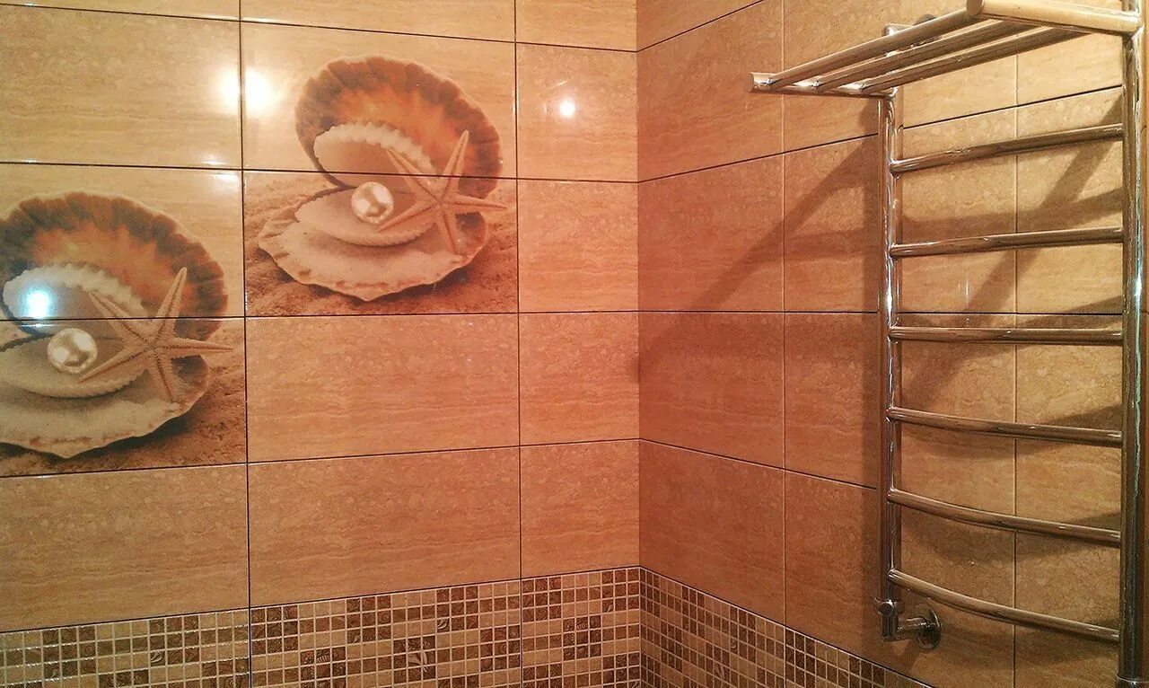Облицовка плиткой работ. Керамическая плитка для стен. Отделка ванной комнаты плиткой. Укладка плитки в ванной. Отделаны керамической плиткой.