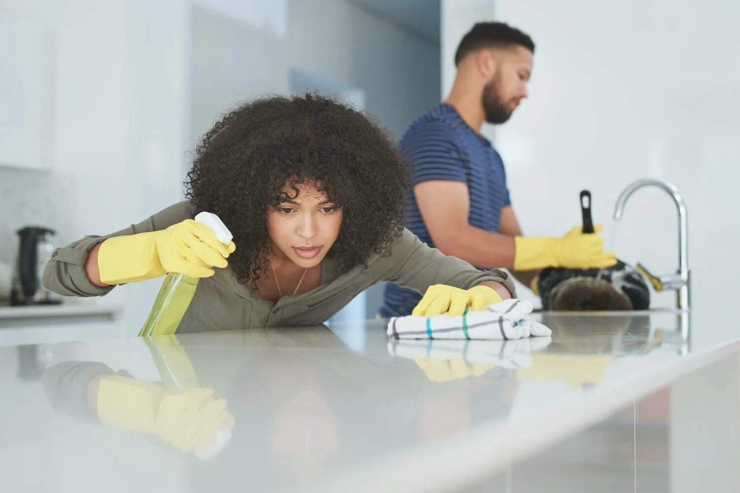 Visitors clean their