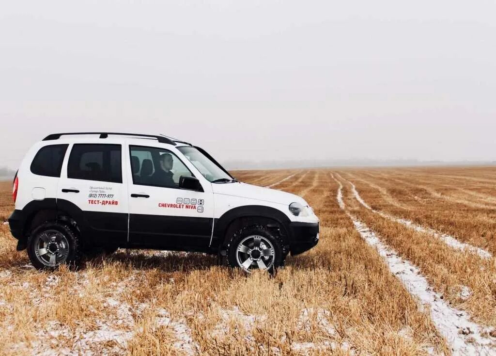 Круиз нива. Lada niva chevrolet. шевроле нива оффроуд. lada нива шевроле 2025. шевроле нива белая оффроуд.
