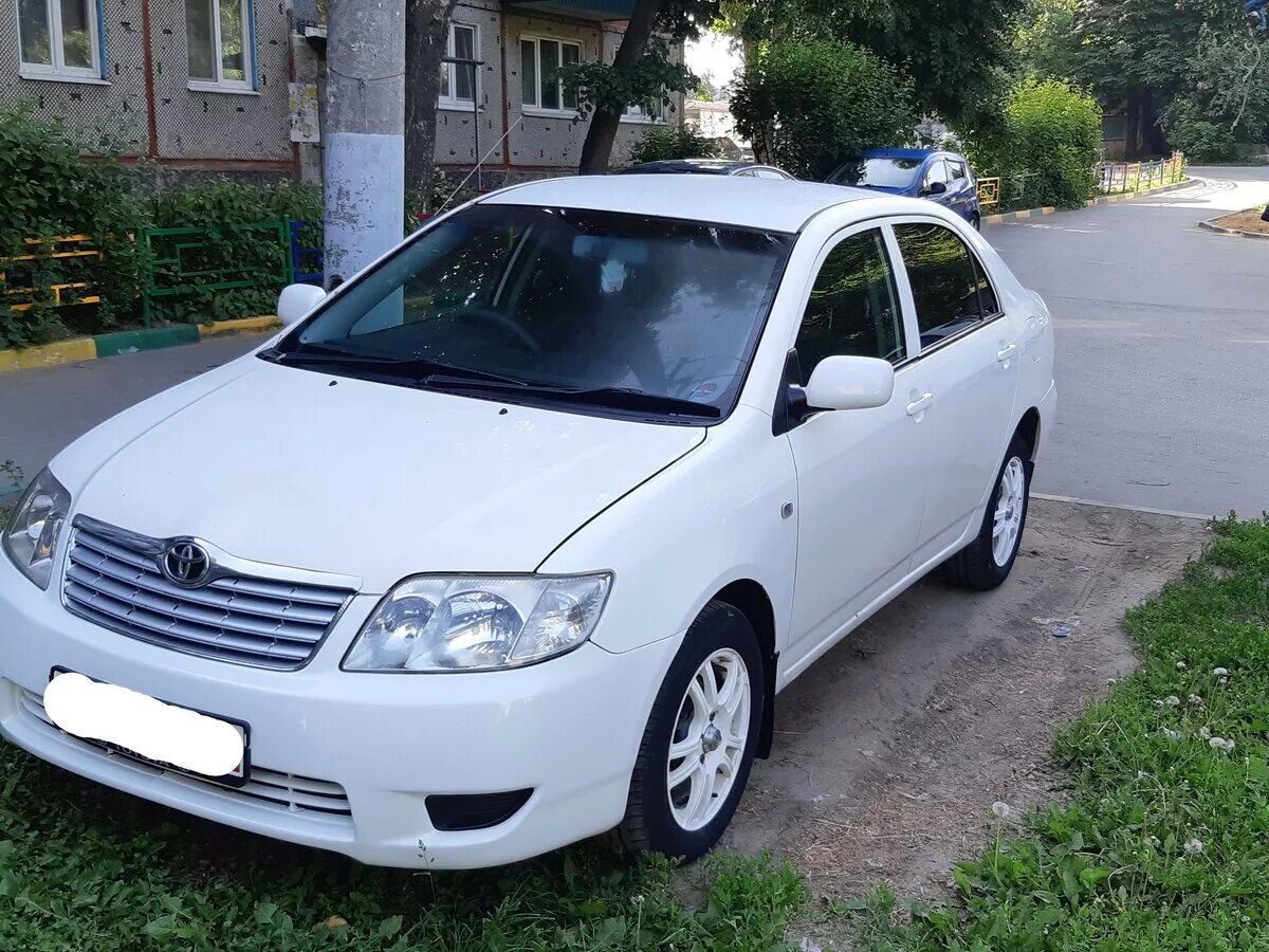 Купить тойоту короллу седан. Toyota Corolla 120 2005. Тойота Королла 2005 е120. Toyota Corolla 120 кузов. Тойота Королла 120 2005.