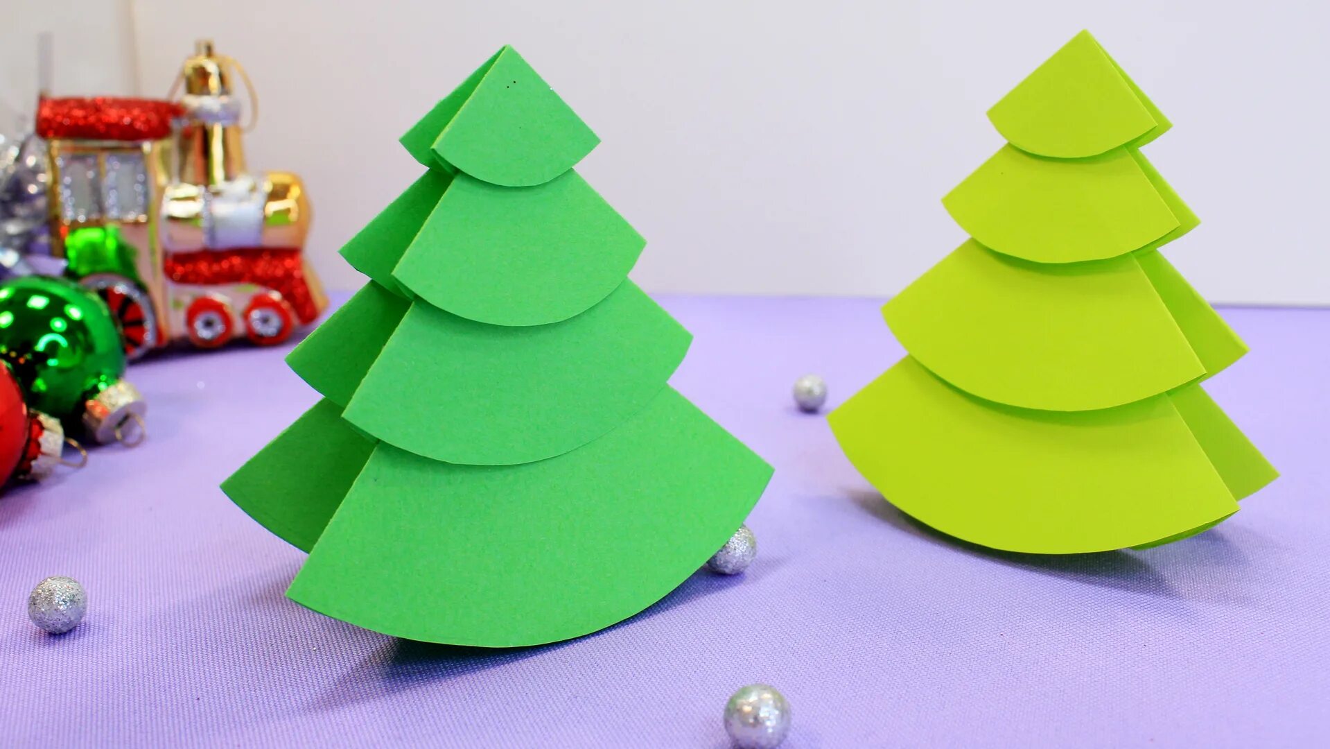 Елка из цветной бумаги объемная. Елочка из бумажных конусов. Елочка из бумажных кругов. Как сделать елку из круга. Елка из кружочков цветной бумаги.