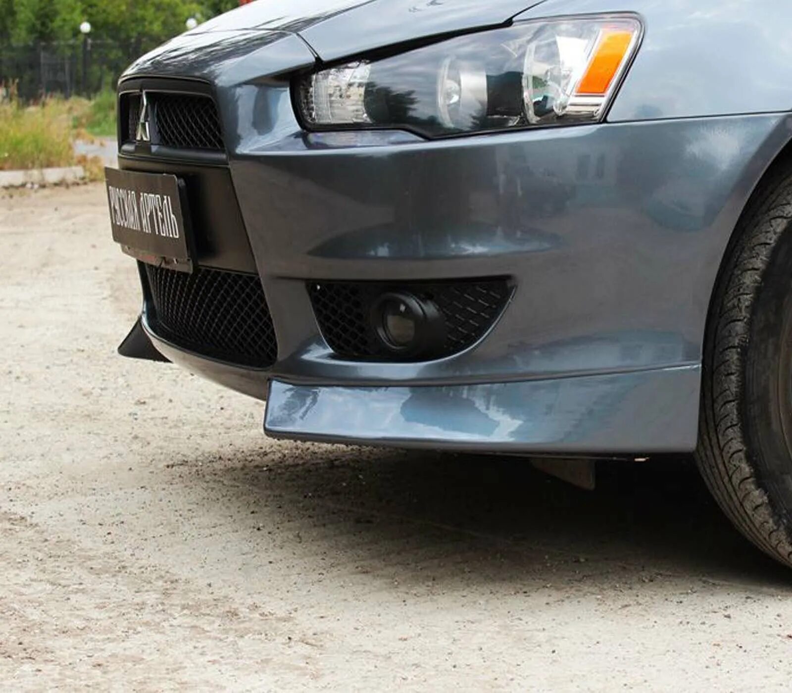 Lancer бампер. Передний бампер с клыками для mitsubishi lancer 10. клыки митсубиси лансер 10. mitsubishi lancer 10 без переднего бампера. клыки митсубиси ланцер 10.