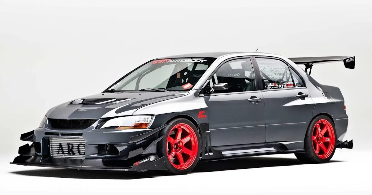 Evo tl. Митсубиси Лансер Эво 9. Лансер 9 Эволюшн. Mitsubishi Lancer EVO 6. Мицубиси Лансер 9 еволютион.