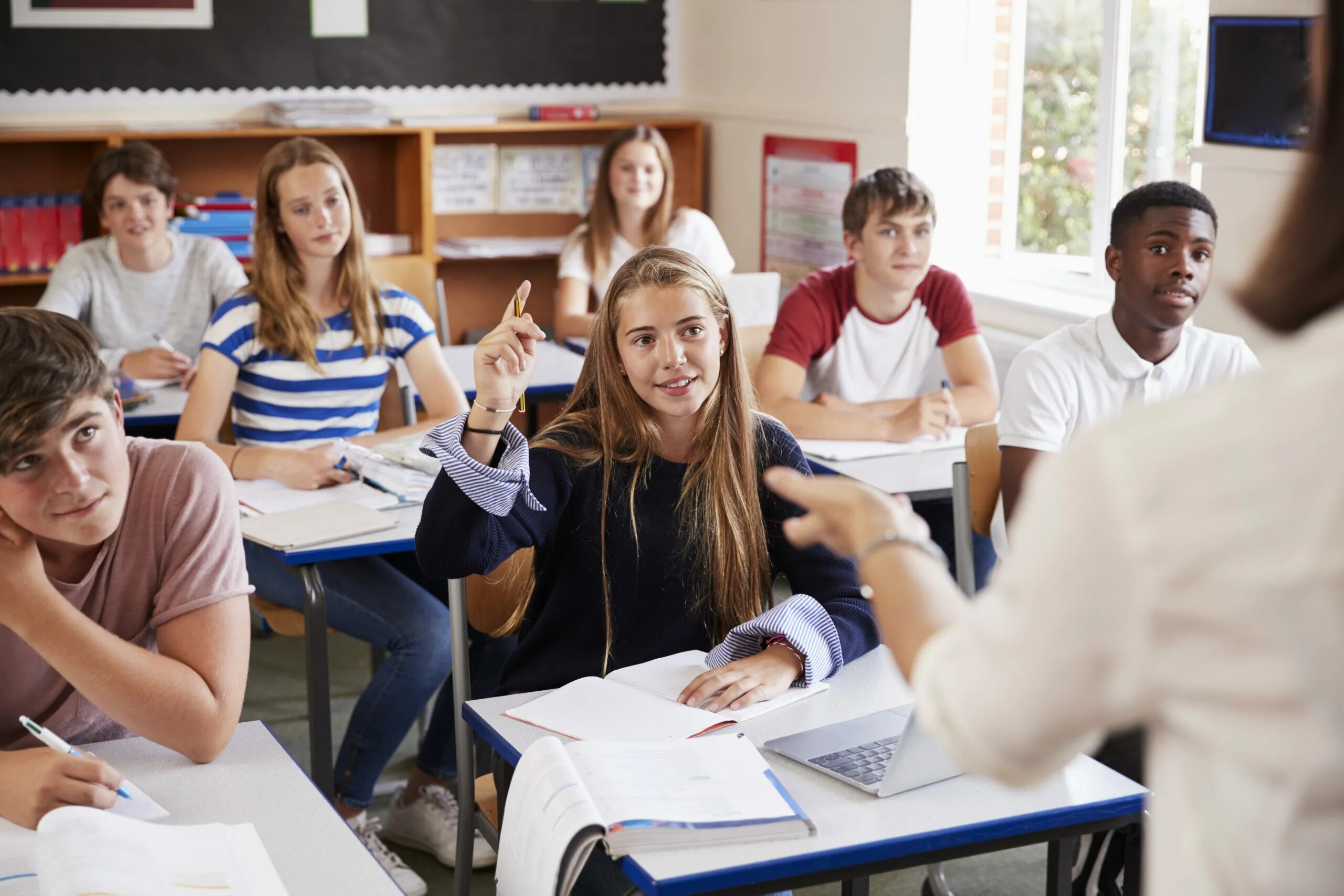 Go home said the teacher. Студентка поднимает руку. Класс Сток. Average student. Raising students' determination..