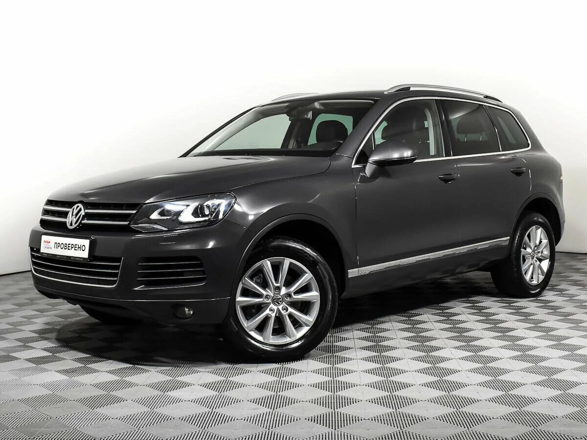 Volkswagen touareg б у. Фольксваген Туарег серый. Touareg II 3.6 at 249 л.с. Туарег 2 серый. Джип Фольксваген Туарег серый.