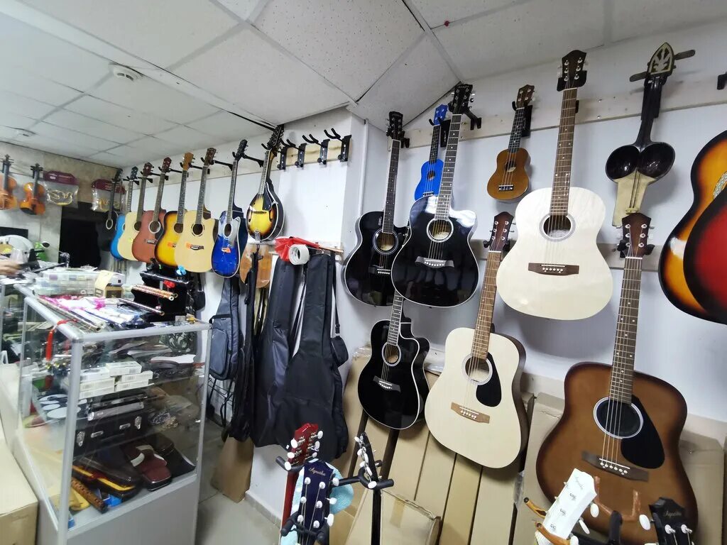 магазин музыкальных инструментов новороссийск. муз магазин волгоград. магазин музыкальных инструментов в уфе. музыкальный магазин. музыкальный магазин волгоград.