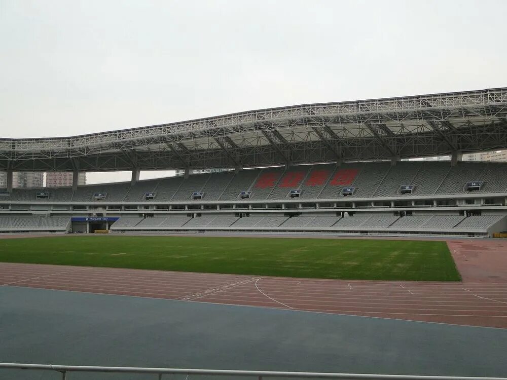 Stadium 7. Шанхай Стэдиум. Шанхай стадион Шэньхуа стадион. Shanghai Port FC Stadium. Шанхайский стадион фото.