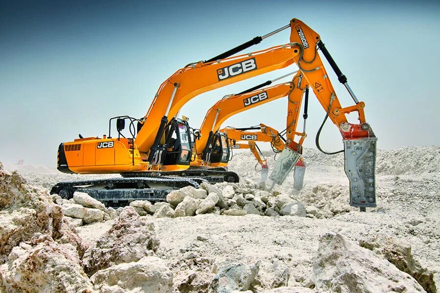 JCB js205nlc. JCB 205 экскаватор гусеничный. JCB 205 NLC С гидромолотом. Гидромолот на гусеничный экскаватор JCB 205. Аренда гусеничного экскаватора с гидромолотом