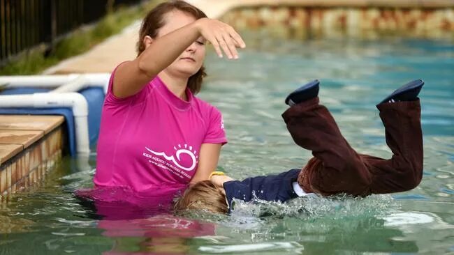 Swim in clothes. Kids wet clothes on the Pool. Kids getting wet clothes. Throw in Pool.