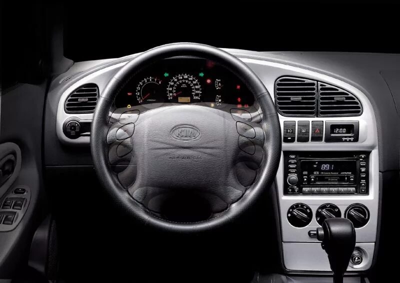 Панель спектра. 2 din kia spectra. Панель спектра. Приборка kia spectra. Kia spectra салон.
