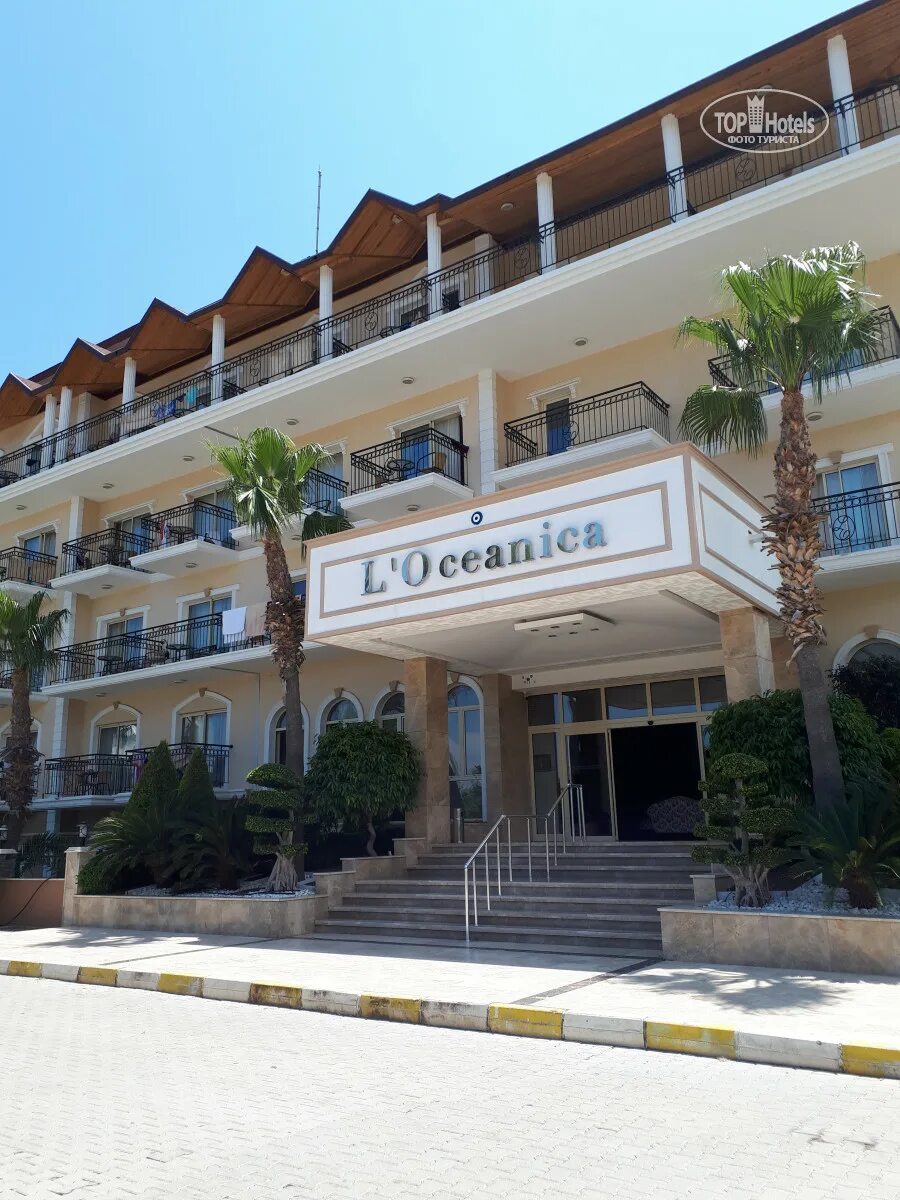 Отель локеаника бич кемер. Отель l'oceanica beach resort hotel. Эль океаника турция кемер. L oceanica beach resort hotel 5 кемер. Отель l'oceanica beach resort hotel.