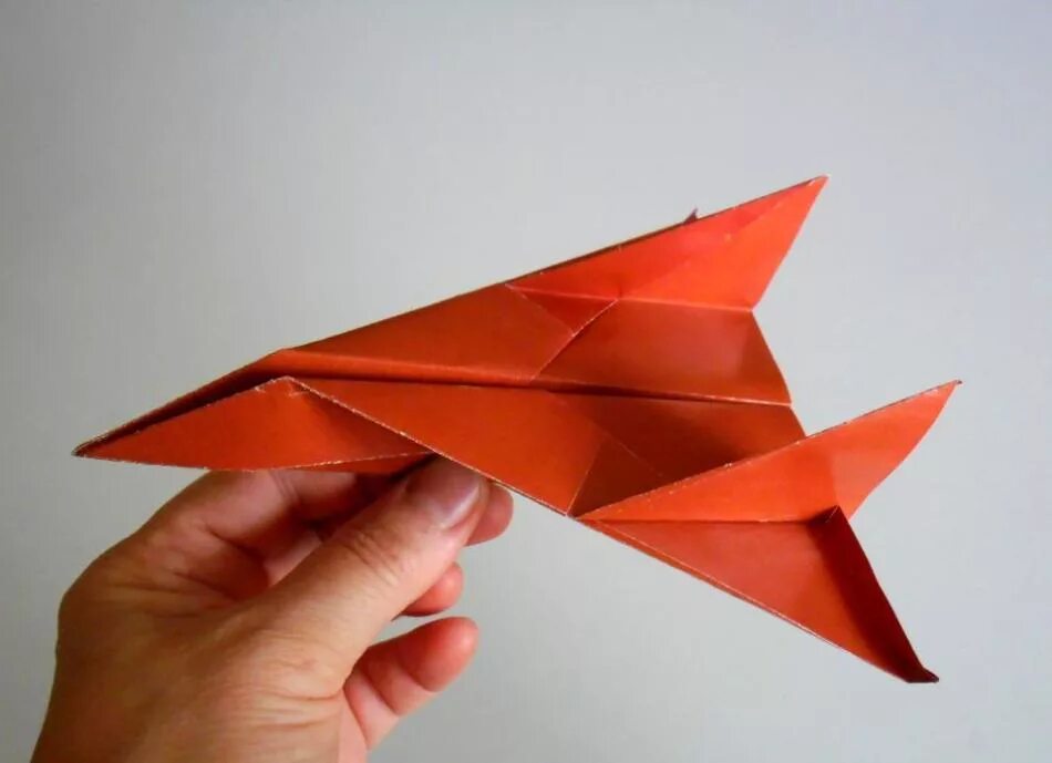 Оригами самолеты летающий. Самолёт из бумаги. Оригами самолетик. Самолет из оригами. Оригами истребитель.